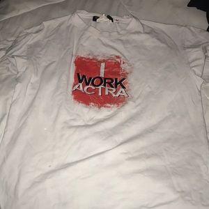 a rag, says “i work at actra”, white, stains